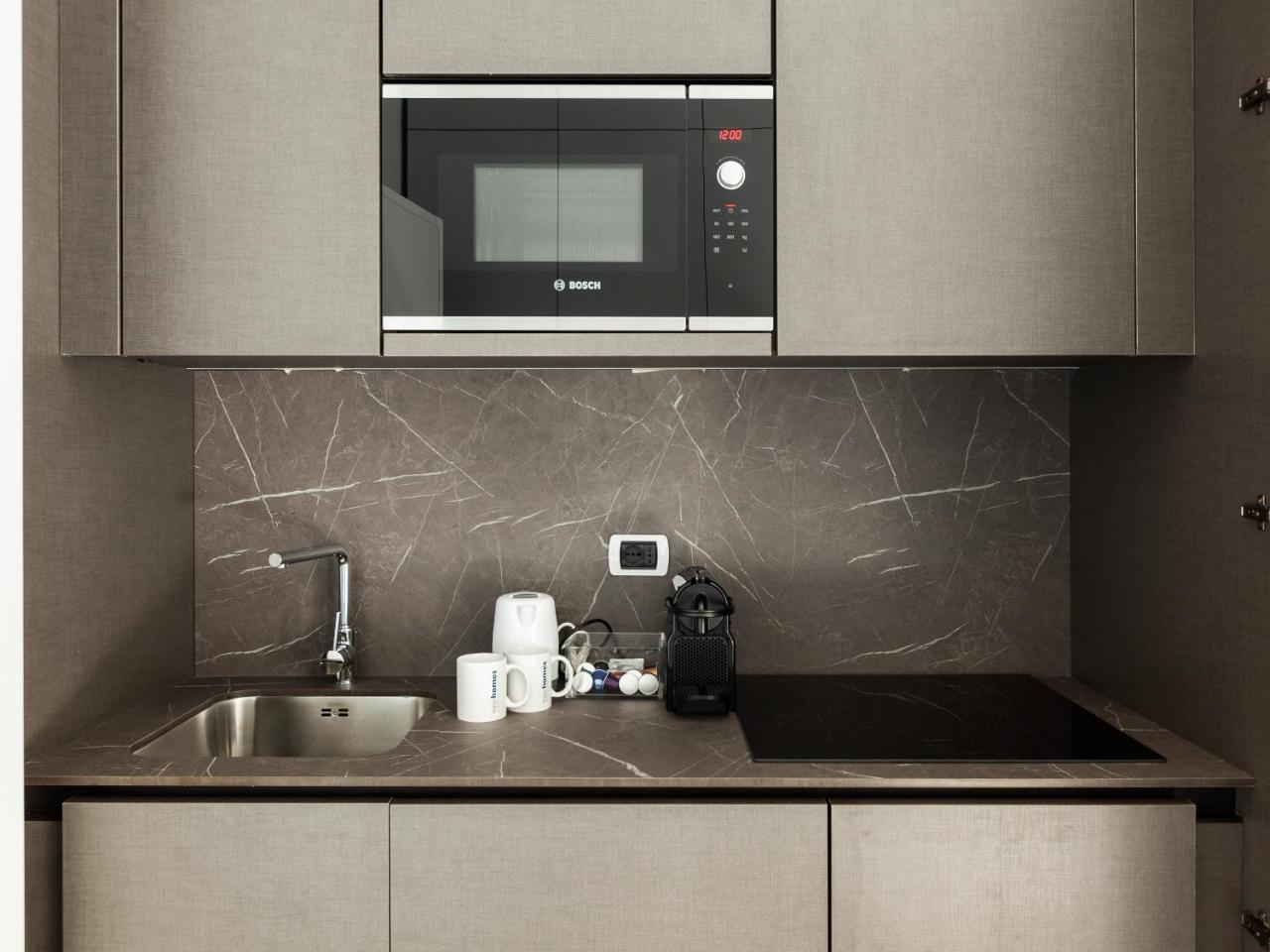 Easyhomes-Duomo Suites & Apartments Milaan Buitenkant foto